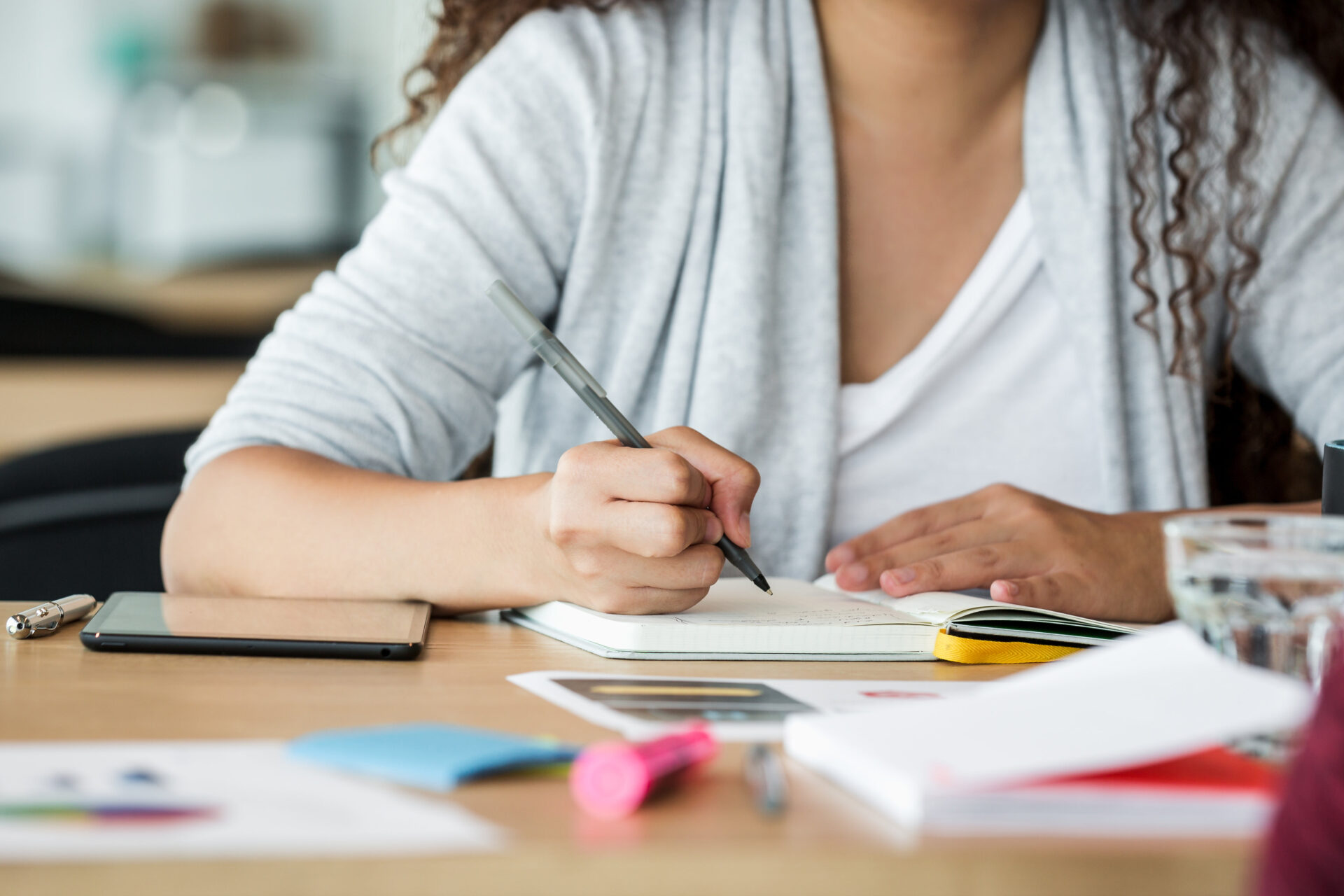 Woman at work taking notes